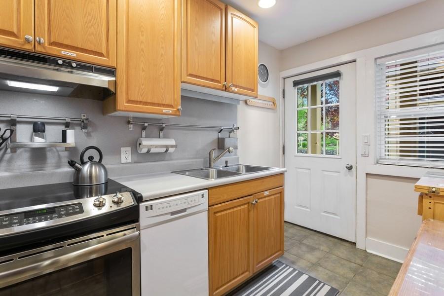 15657 Lakeshore Road, Unit 15 Union Pier, MI 49129 - Photo 6 of 19 06_15657LakeshoreRd_Unit15_5_Kitchen_Low