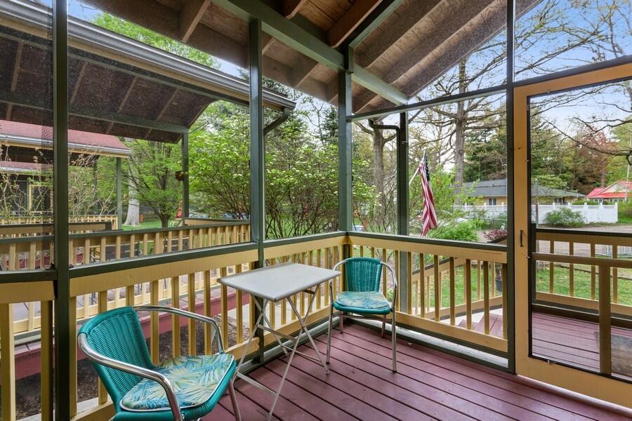 15657 Lakeshore Road, Unit 15 Union Pier, MI 49129 - Photo 10 of 19 10_15657LakeshoreRd_Unit15_97_SunRoom_Lo