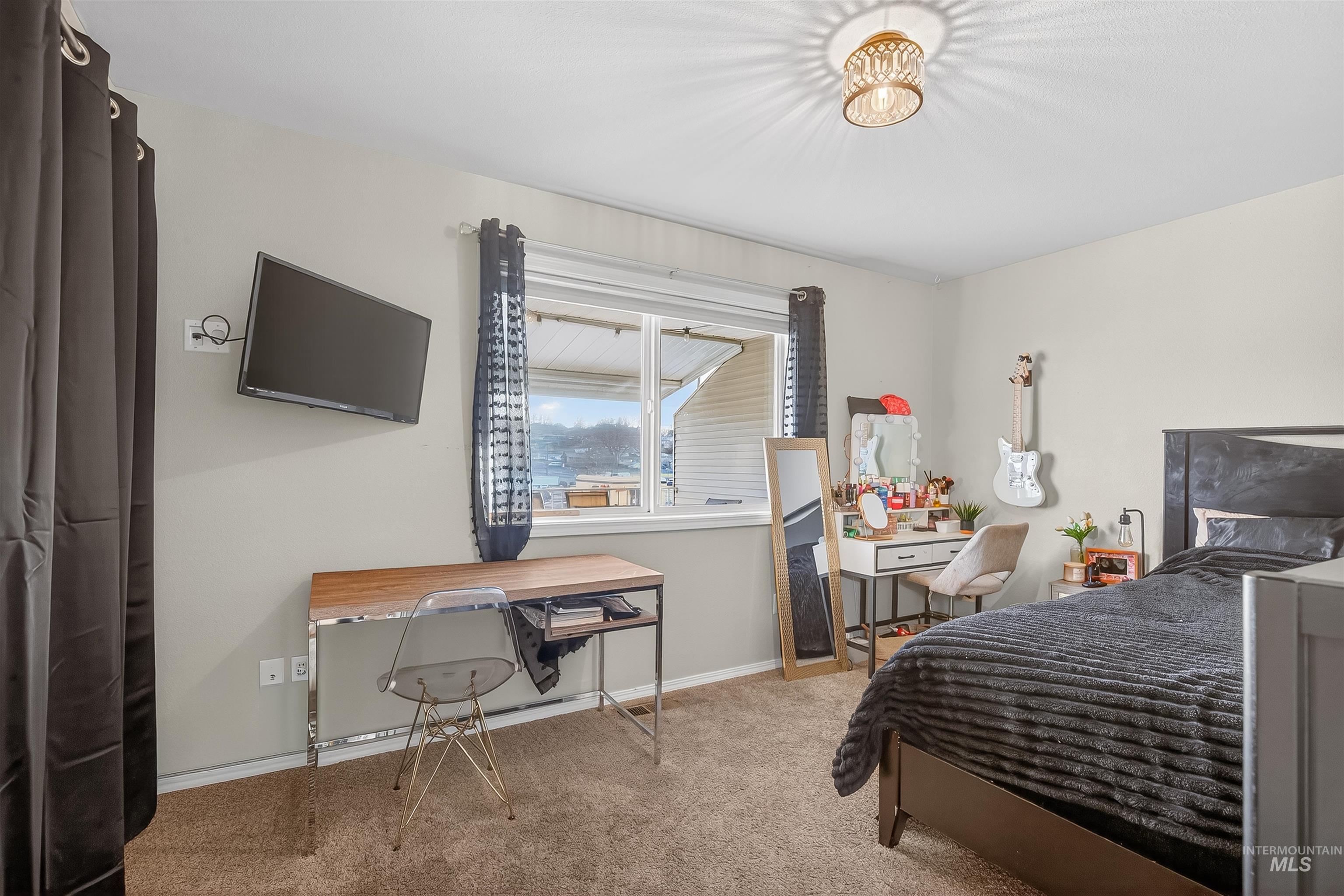 822 15th Avenue Lewiston, ID 83501 - Photo 23 of 44 Bedroom with baseboards and carpet floors