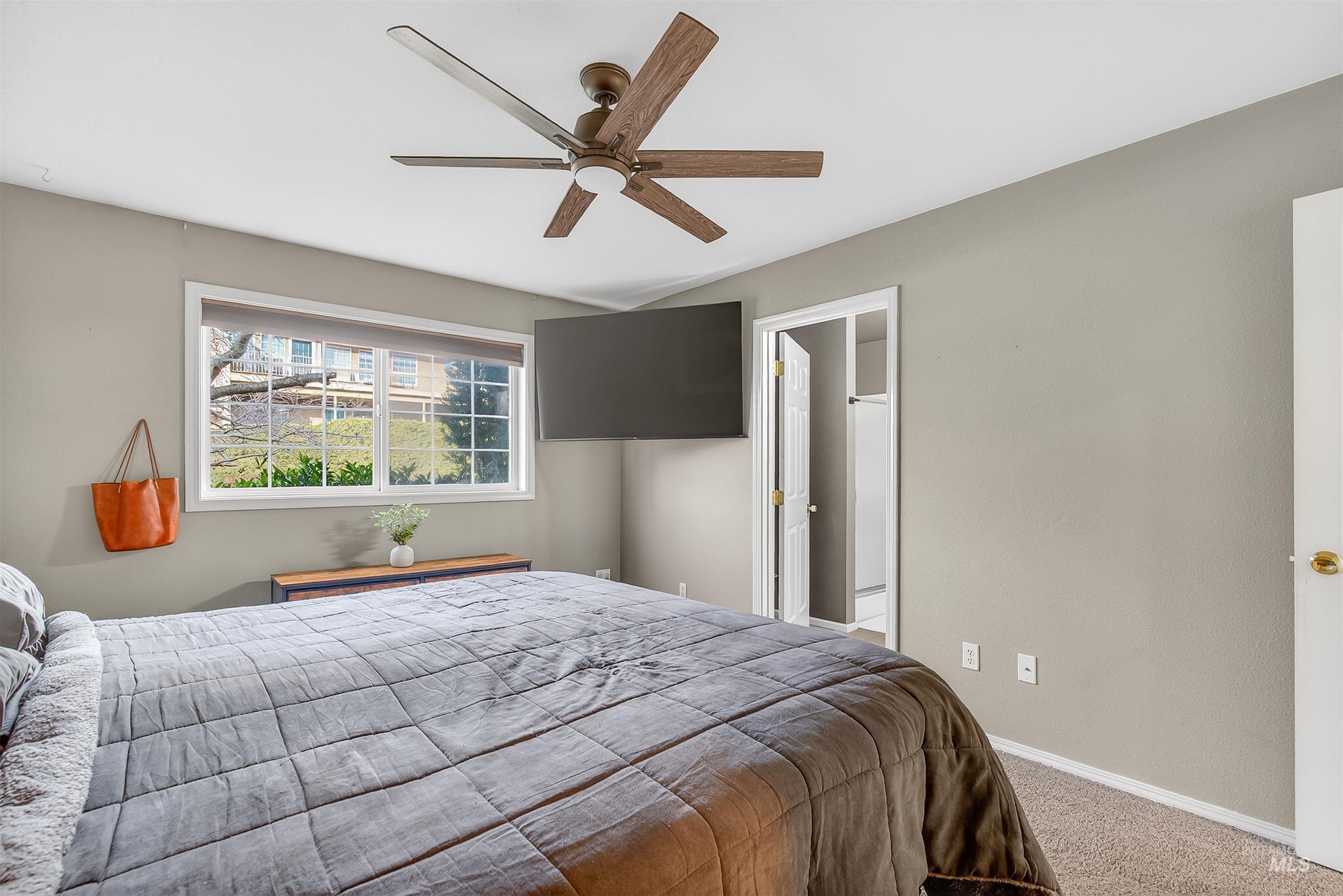 822 15th Avenue Lewiston, ID 83501 - Photo 25 of 44 Bedroom with carpet floors, a ceiling fan, and ensuite bathroom