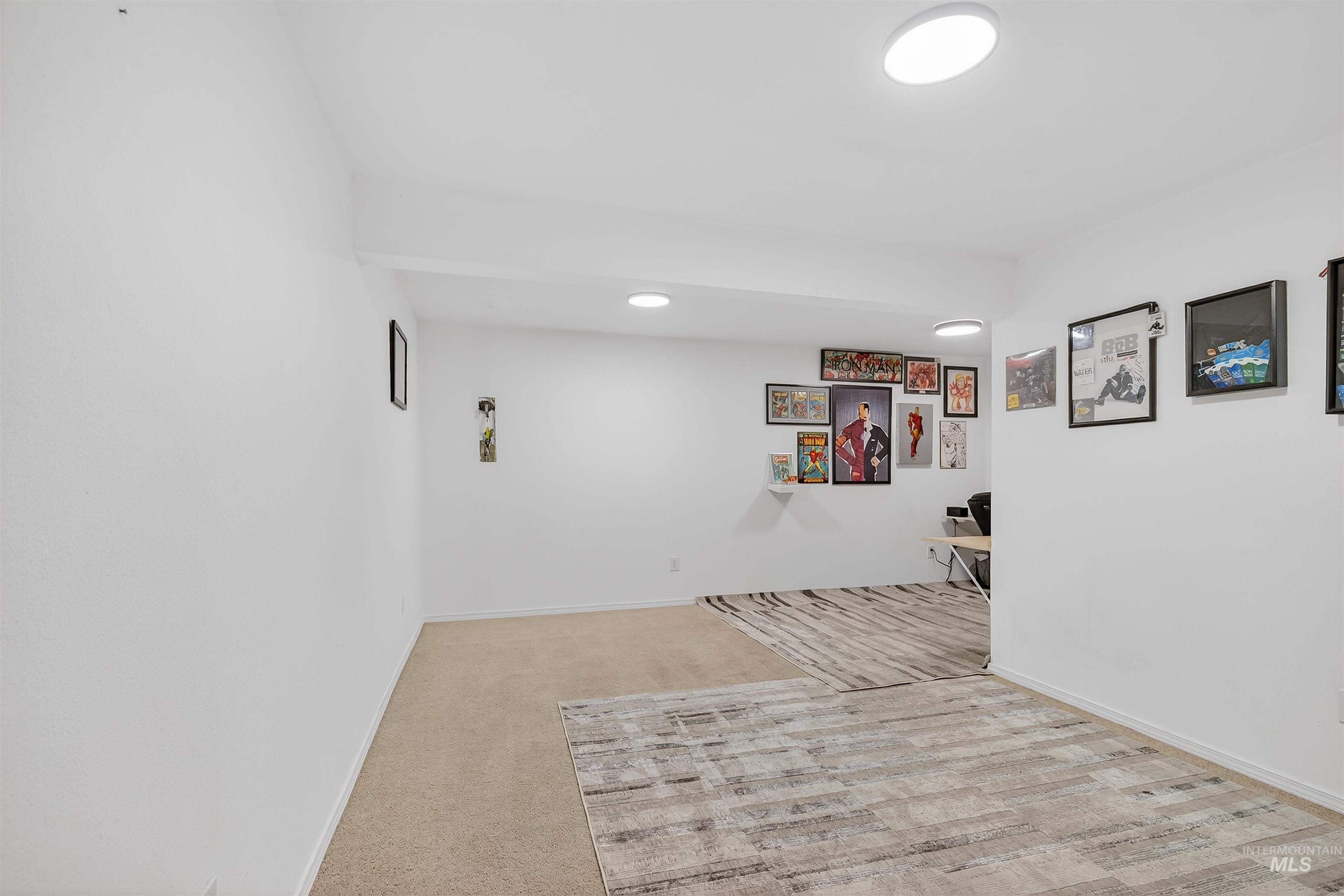 822 15th Avenue Lewiston, ID 83501 - Photo 36 of 44 Basement with light carpet, a desk, and recessed lighting
