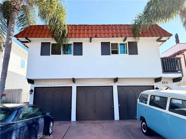 a view of a patio with table and chairs