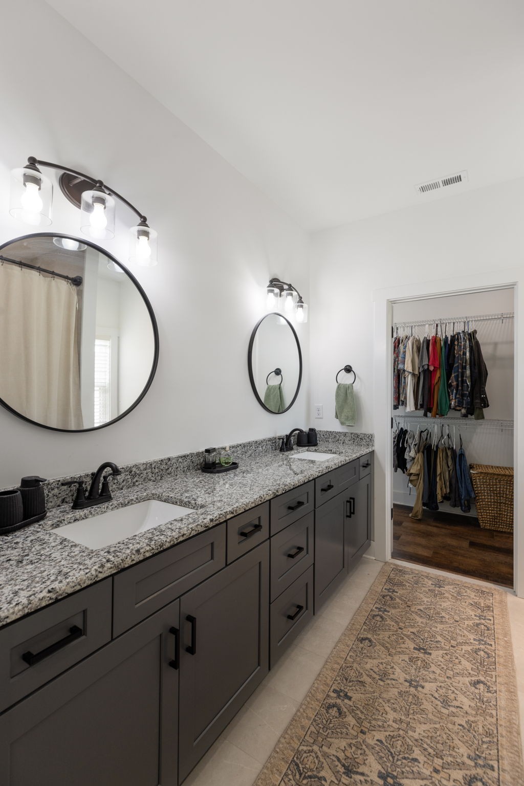 1578 Angus Way Greenbrier, TN 37073 - Photo 33 of 45 a bathroom with a granite countertop double vanity and a mirror