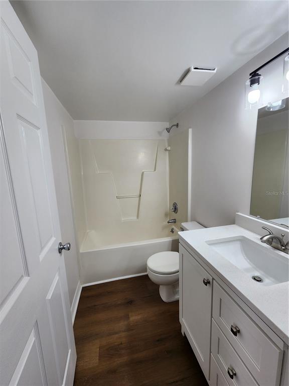 5823 Southwest 9th Place, Unit H55 Gainesville, FL 32607 - Photo 10 of 50 a bathroom with a sink a toilet and shower