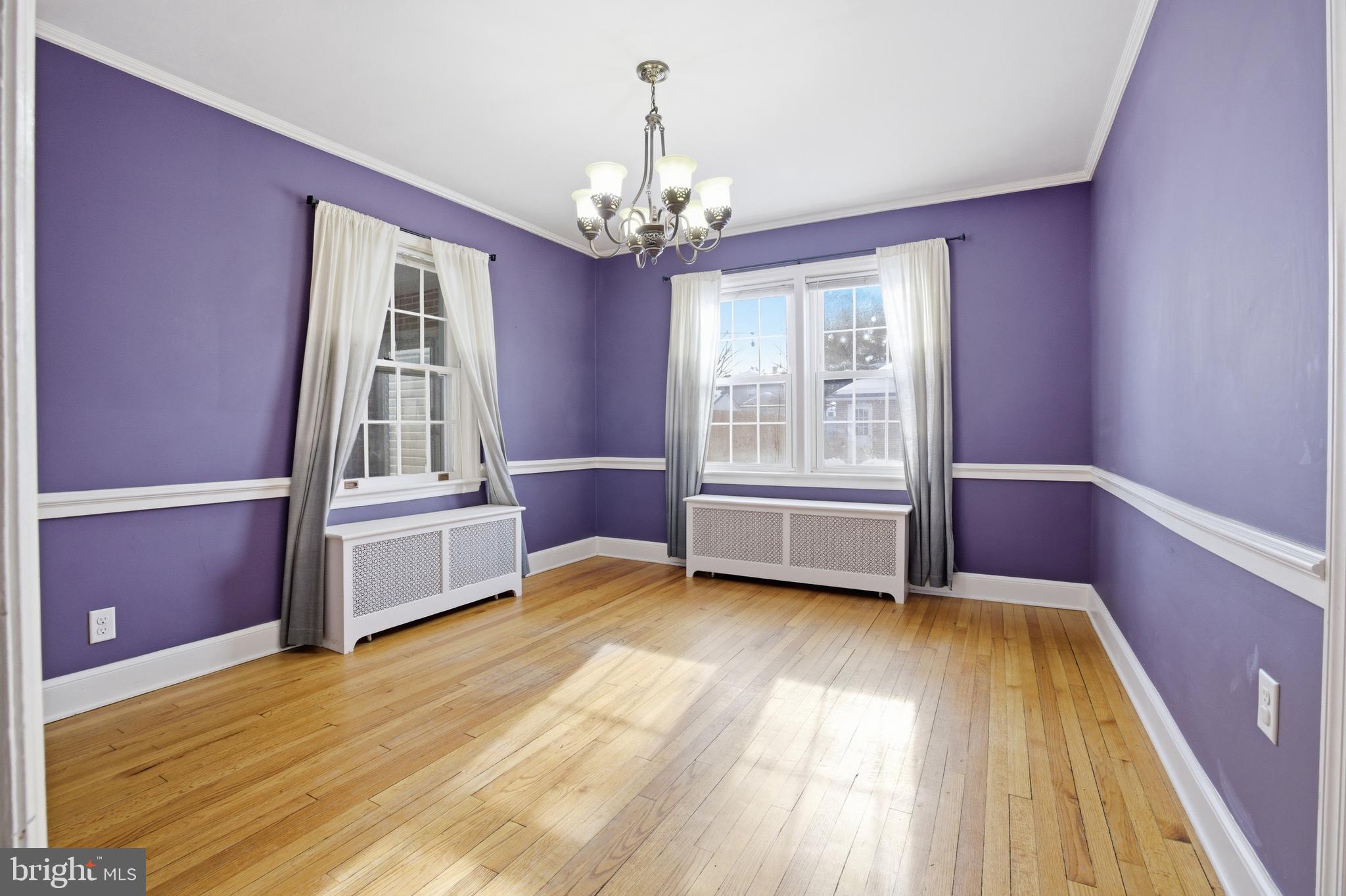 68 Maple Avenue Littlestown, PA 17340 - Photo 12 of 37 a view of an empty room with a window and wooden floor
