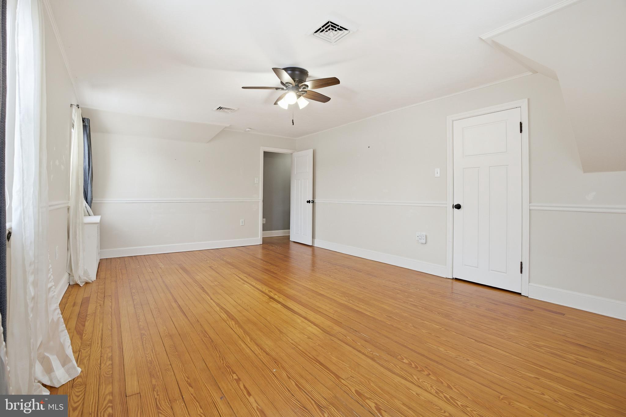68 Maple Avenue Littlestown, PA 17340 - Photo 16 of 37 wooden floor in an empty room