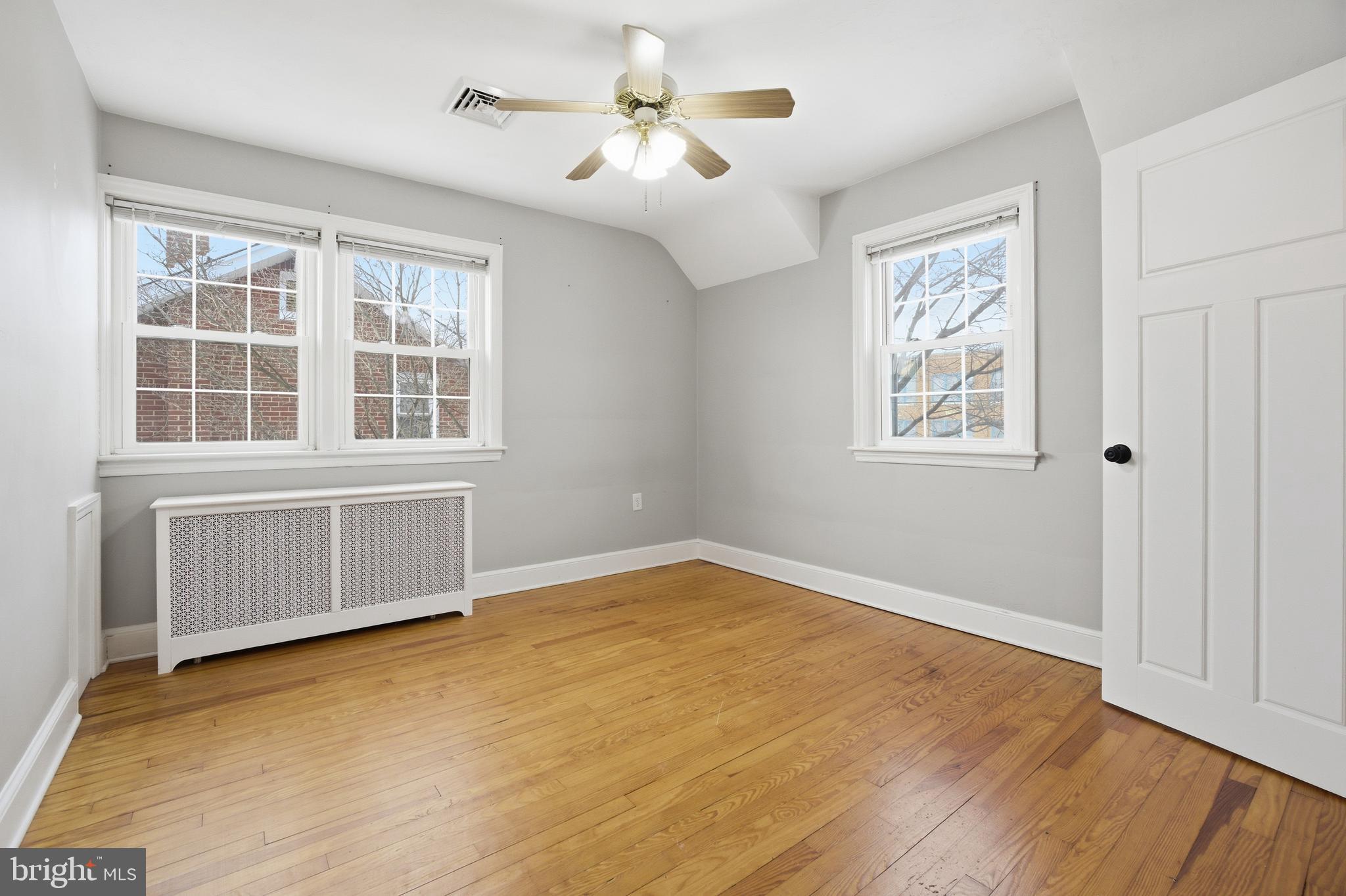 68 Maple Avenue Littlestown, PA 17340 - Photo 18 of 37 an empty room with windows and ceiling fan