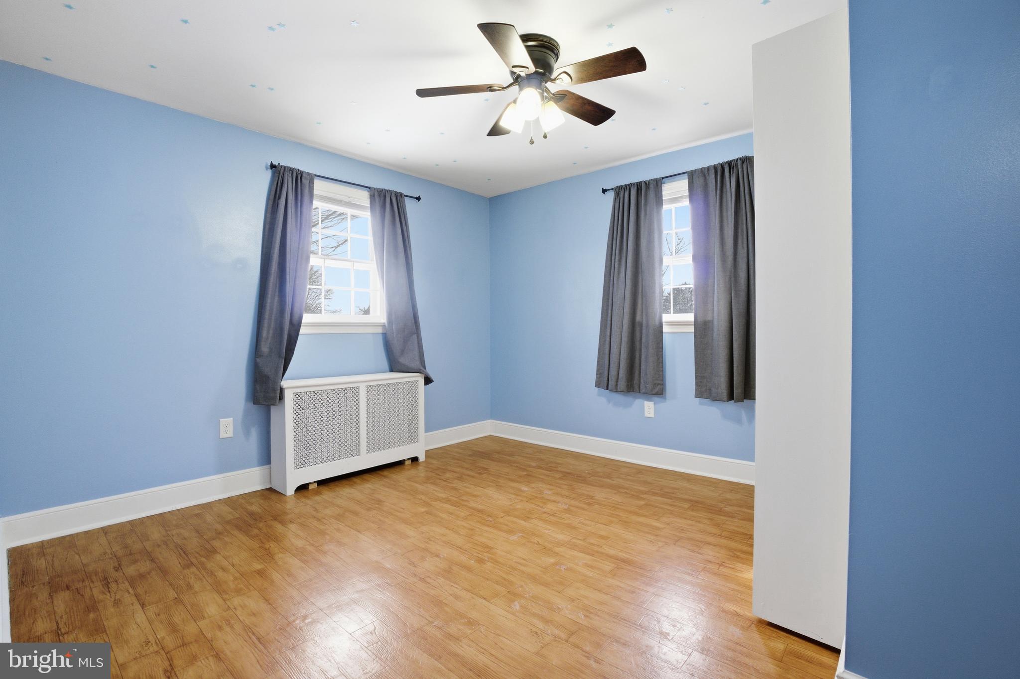 68 Maple Avenue Littlestown, PA 17340 - Photo 21 of 37 wooden floor in an empty room with a window