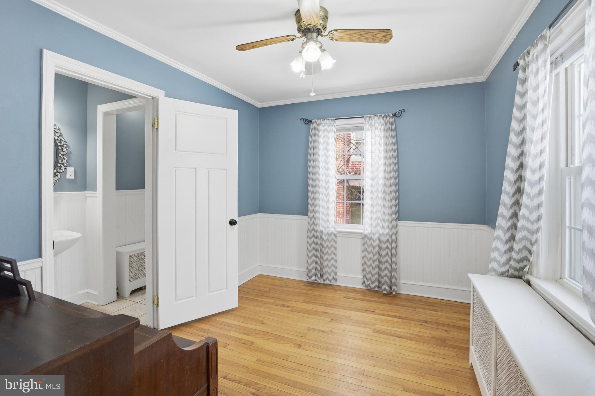 68 Maple Avenue Littlestown, PA 17340 - Photo 7 of 37 a view of empty room with wooden floor and fan