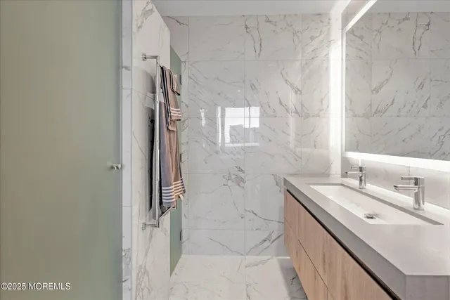 a kitchen with a sink and a large window