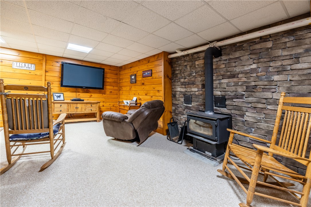 4128 River Road York, NY 14533 - Photo 35 of 50 LOWER LEVEL LIVING & ACTIVITY ROOM