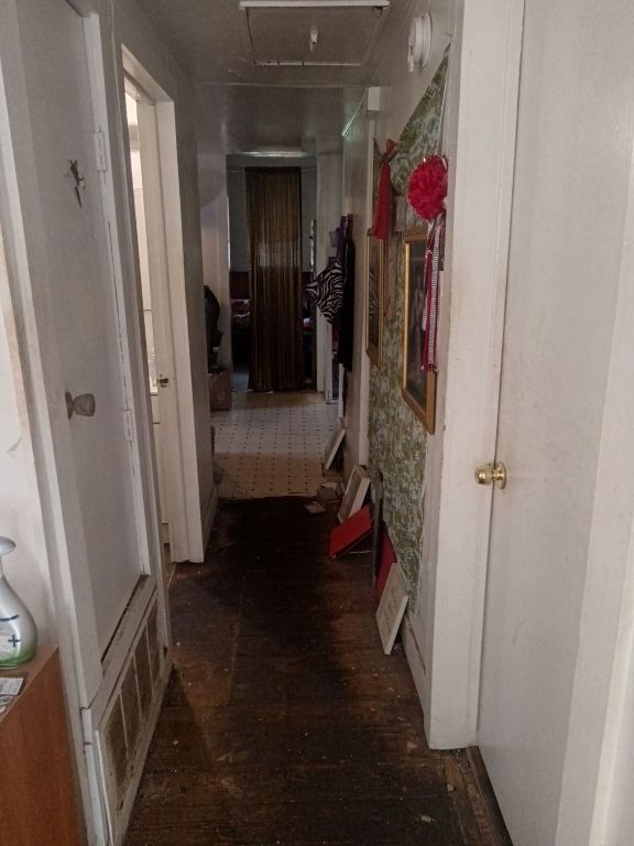 3208 East 16th Street Austin, TX 78721 - Photo 5 of 5 Corridor with wood-type flooring and visible vents