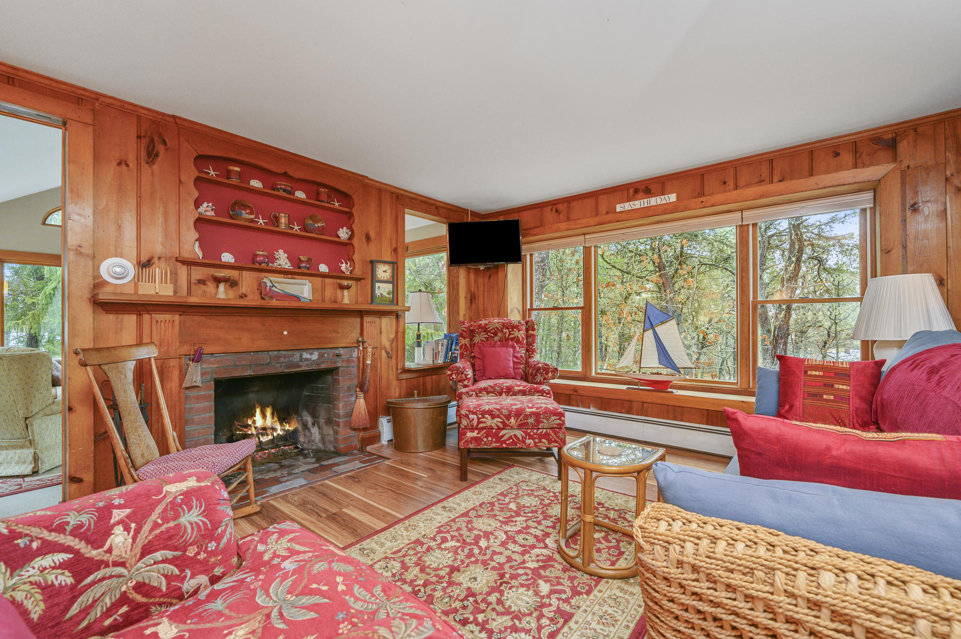 88 Deep Hole Road Harwich Port, MA 02646 - Photo 6 of 30 a living room with furniture and a fireplace