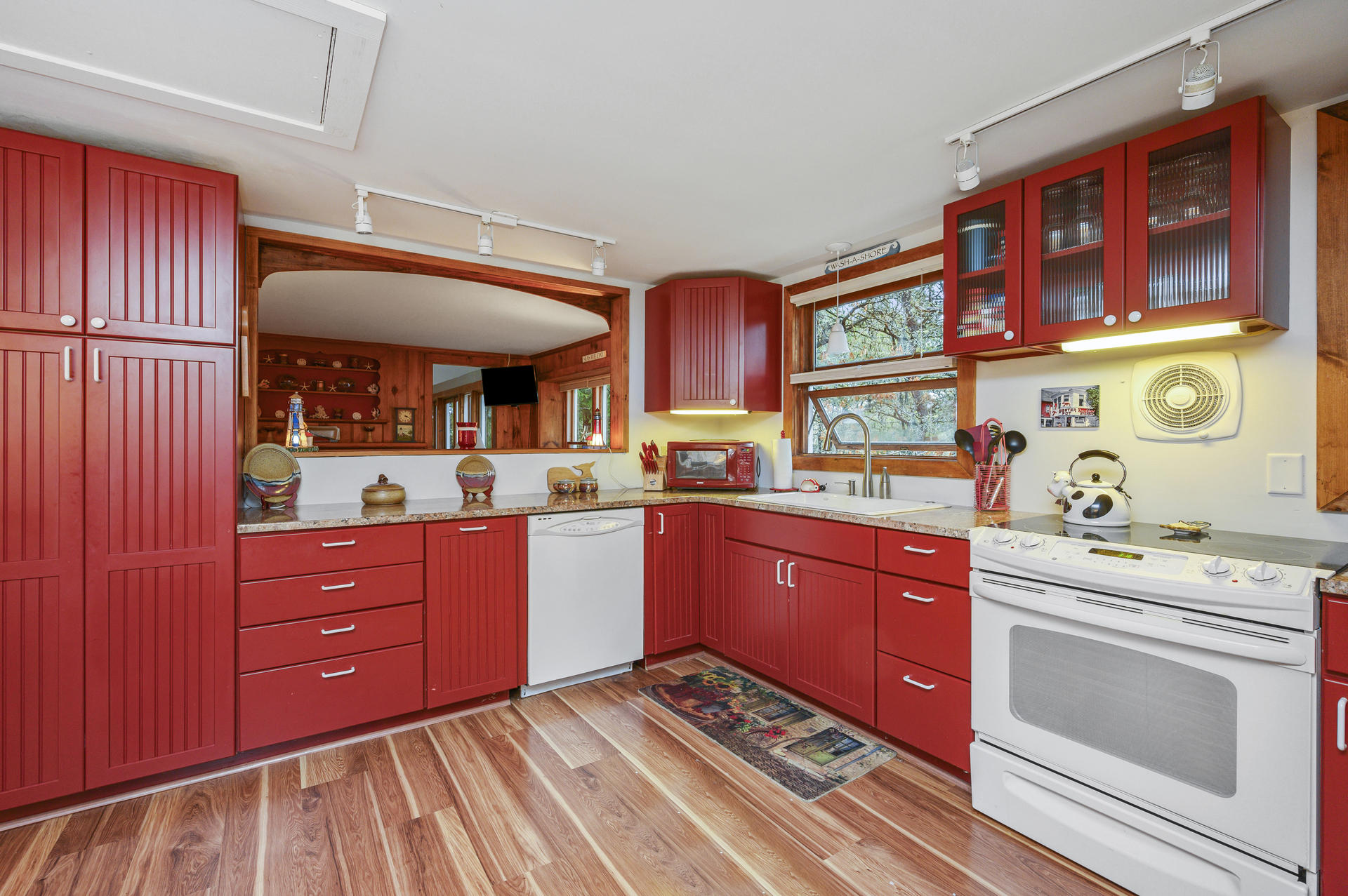 88 Deep Hole Road Harwich Port, MA 02646 - Photo 9 of 30 a kitchen with stainless steel appliances granite countertop a stove and cabinets