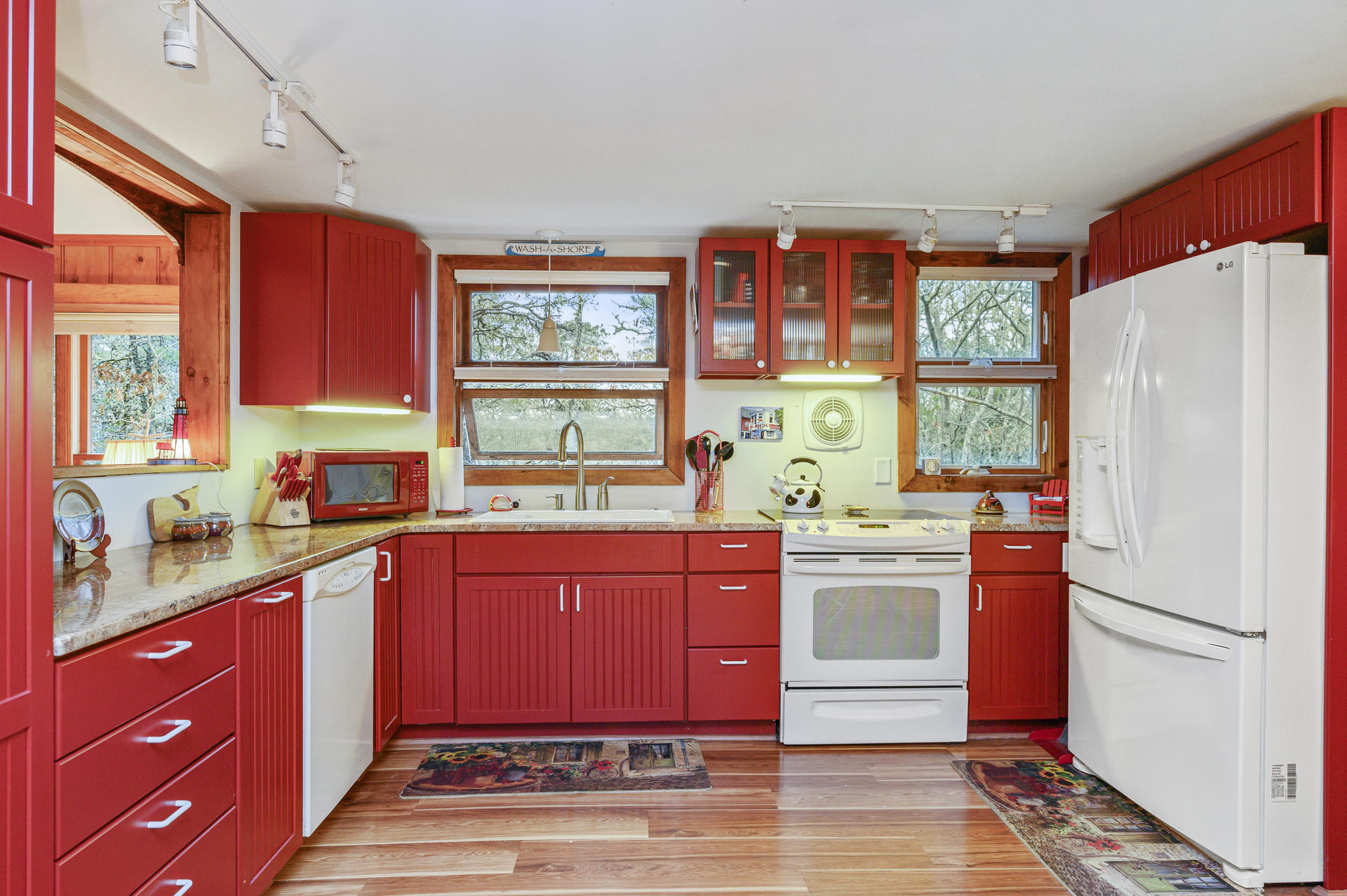 88 Deep Hole Road Harwich Port, MA 02646 - Photo 10 of 30 a kitchen with stainless steel appliances granite countertop a refrigerator and sink