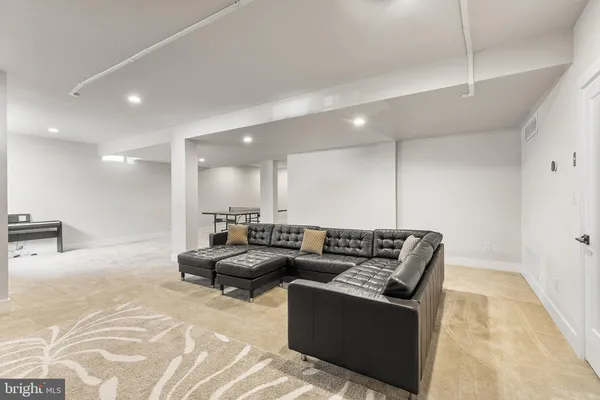 a living room with furniture and a couch