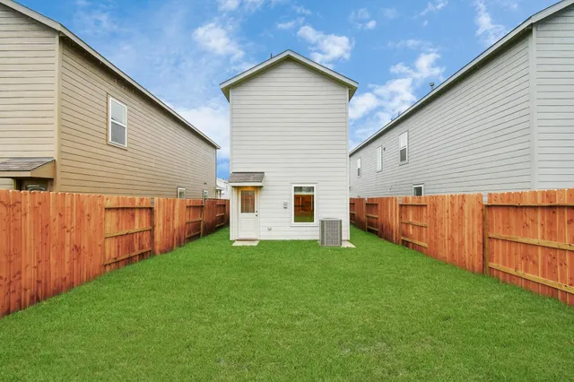 a view of a backyard with a garden