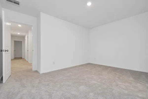 an empty room with a natural light