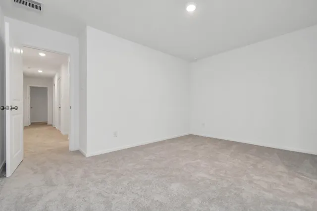 an empty room with a natural light