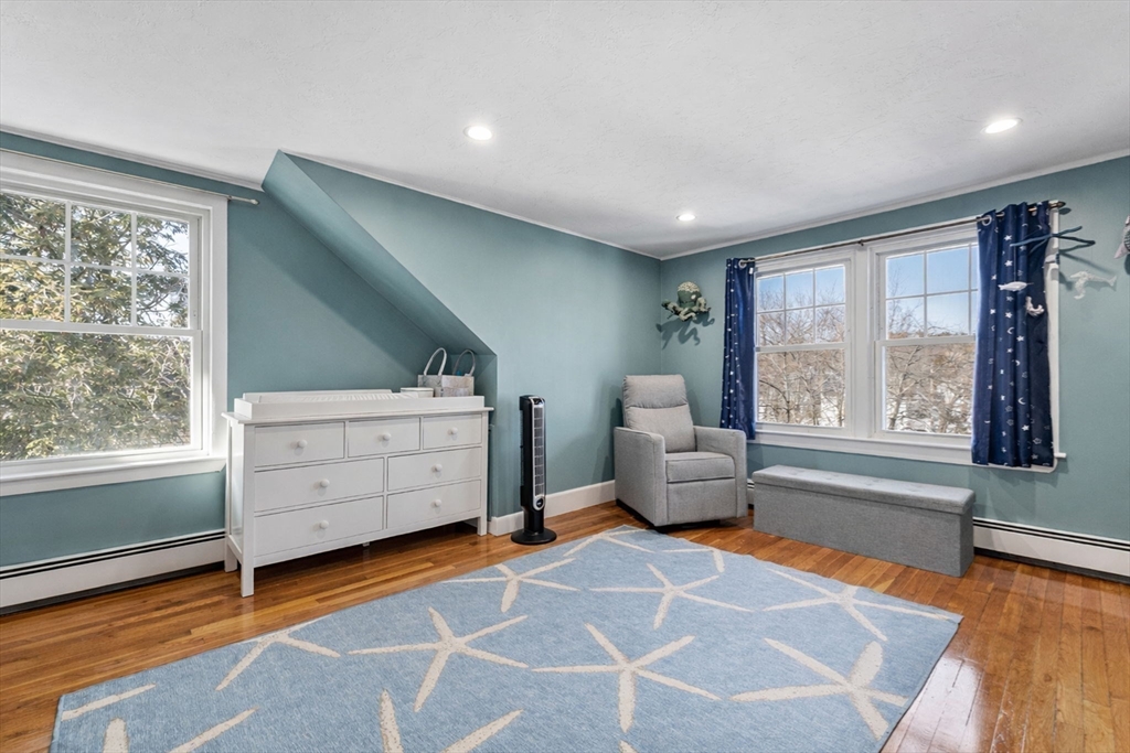 424 Brook Road Milton, MA 02186 - Photo 23 of 41 a living room with furniture and a large window