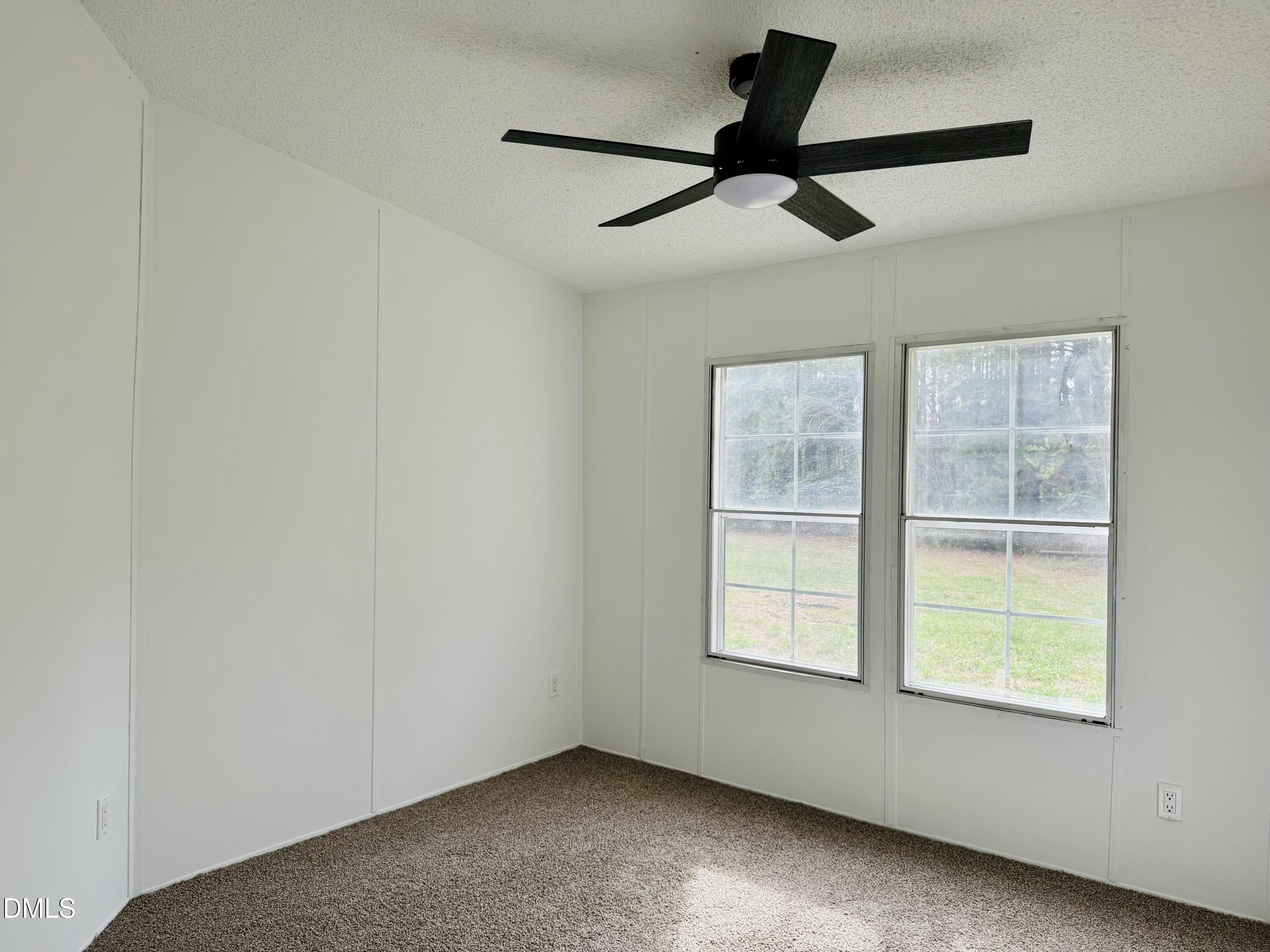 128 Lisa Cheryl Lane Roxboro, NC 27573 - Photo 15 of 23 a room with window and a ceiling fan