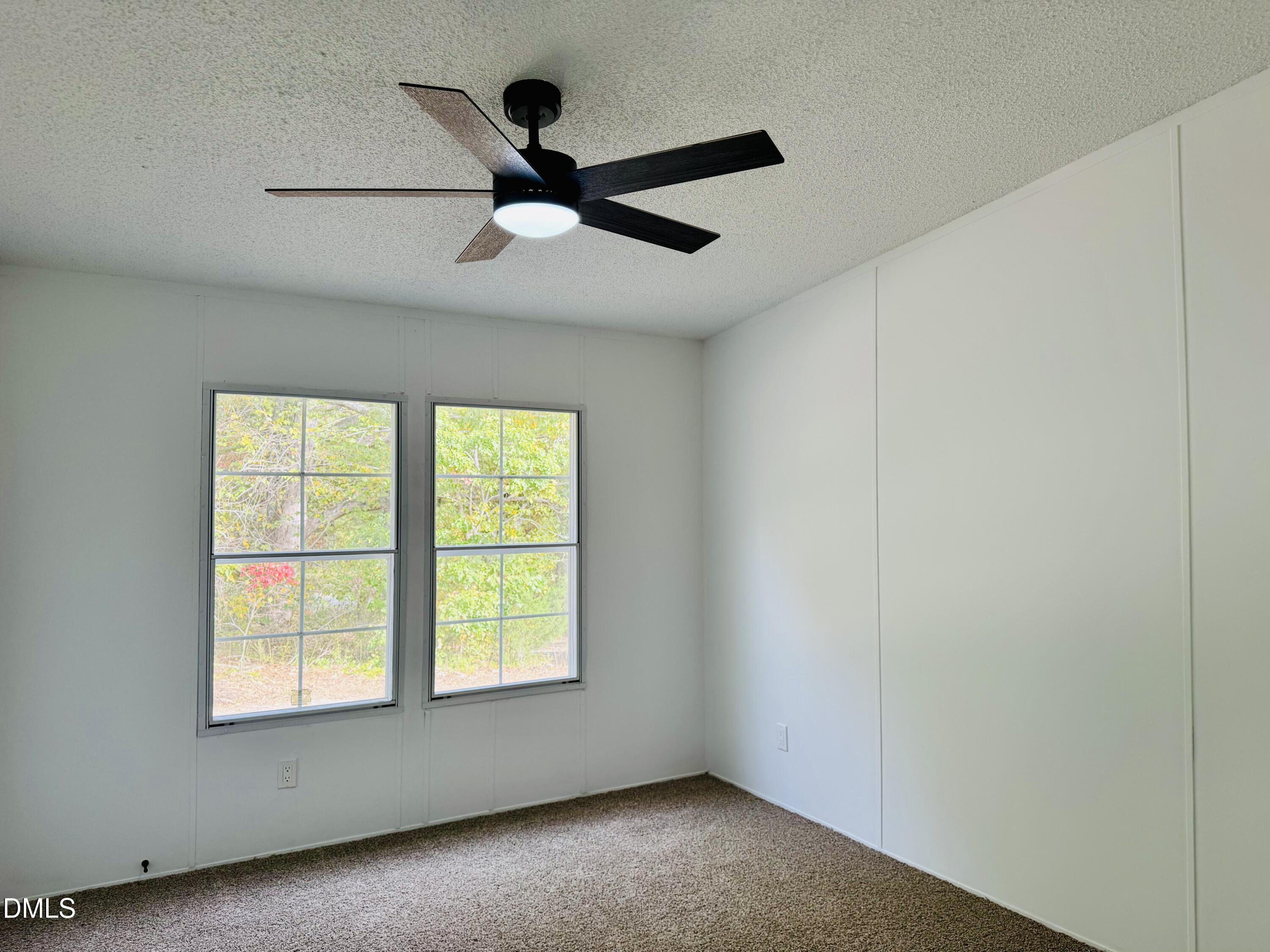 128 Lisa Cheryl Lane Roxboro, NC 27573 - Photo 23 of 23 a view of an empty room with a window