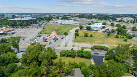 a view of a yard in front of a house
