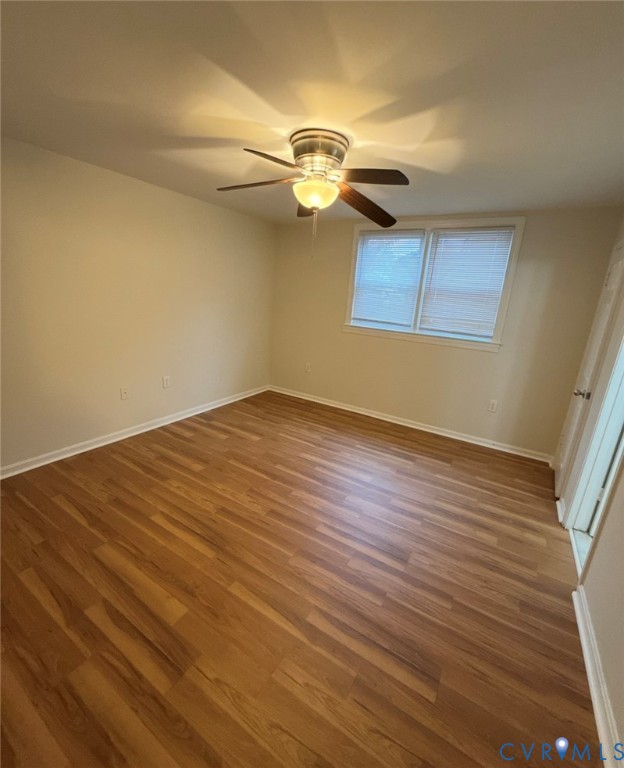 1515 Presidential Drive Henrico, VA 23228 - Photo 18 of 21 a view of a room with wooden floor and ceiling fan