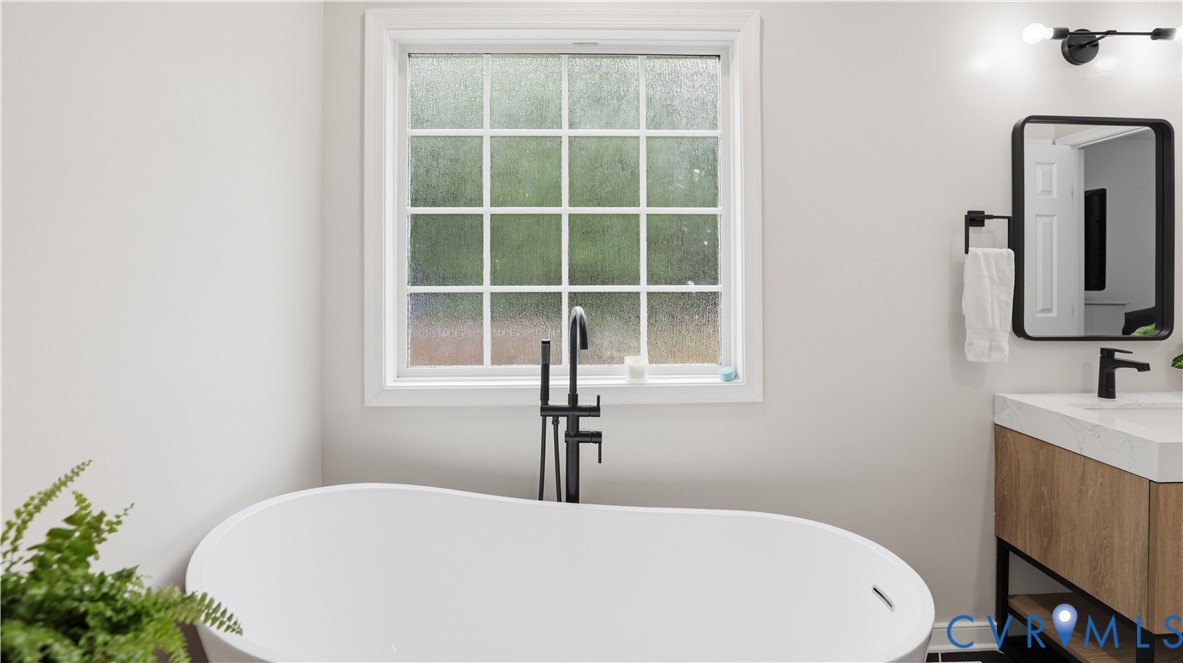 2406 Emanuel Church Road Powhatan, VA 23139 - Photo 29 of 48 Freestanding soaking tub with floor-mounted matte