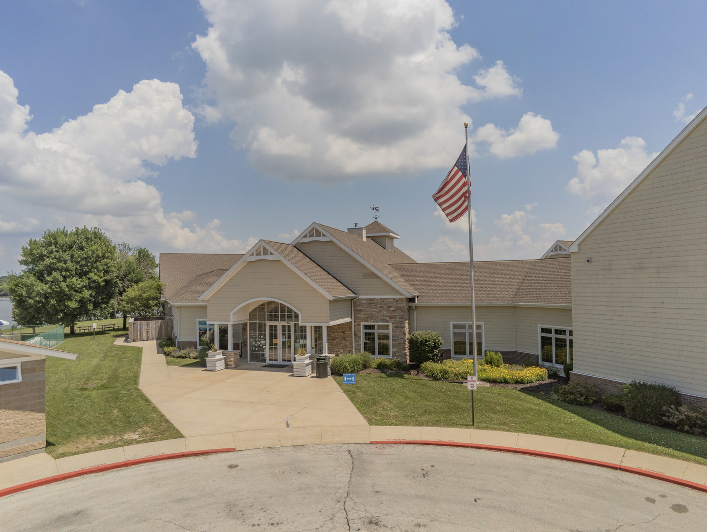 416 Benedict Drive Southwest Poplar Grove, IL 61065 - Photo 15 of 30 a front view of a house with a garden and parking