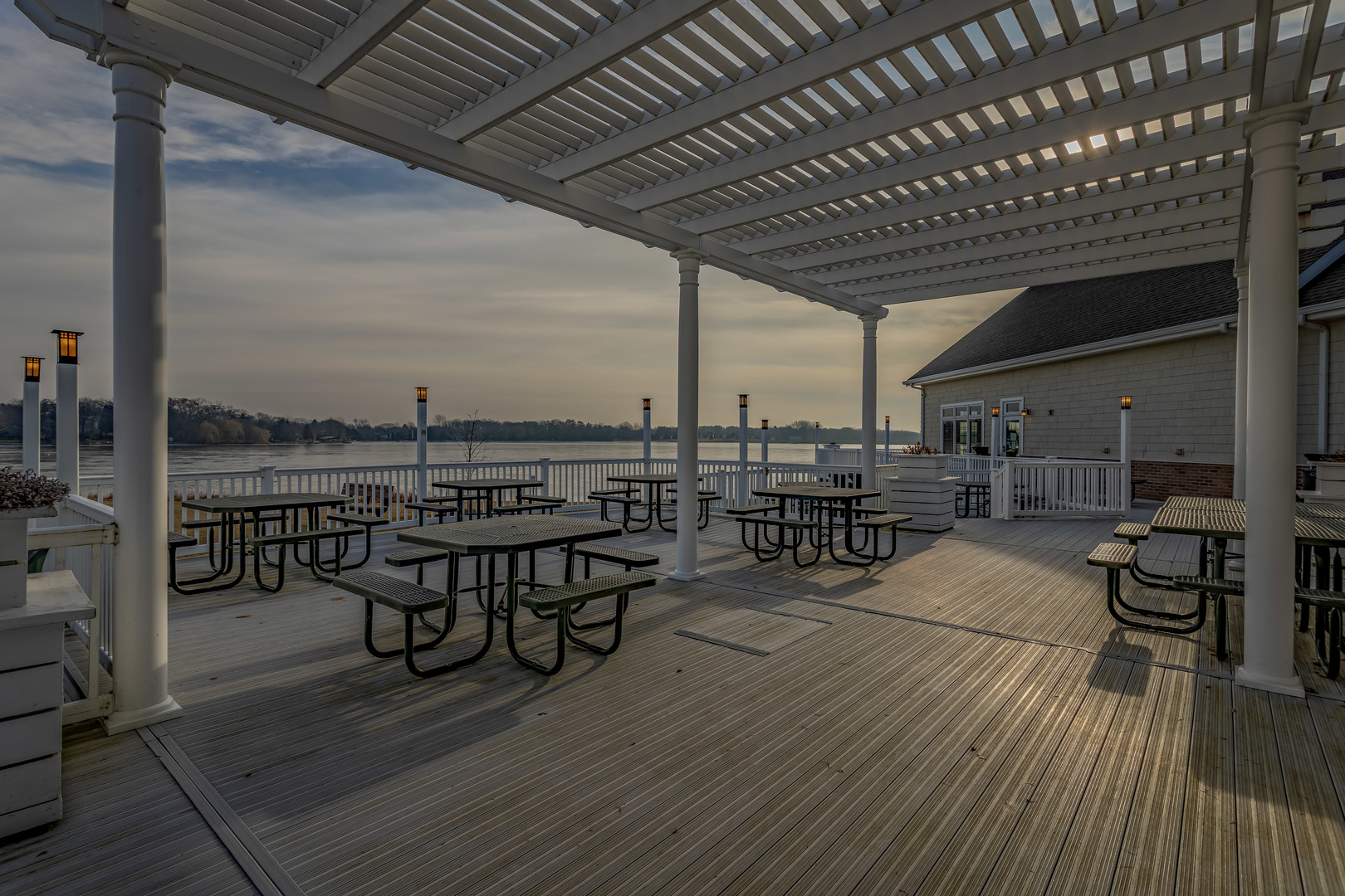 416 Benedict Drive Southwest Poplar Grove, IL 61065 - Photo 10 of 30 a view of a patio with table and chairs with wooden floor