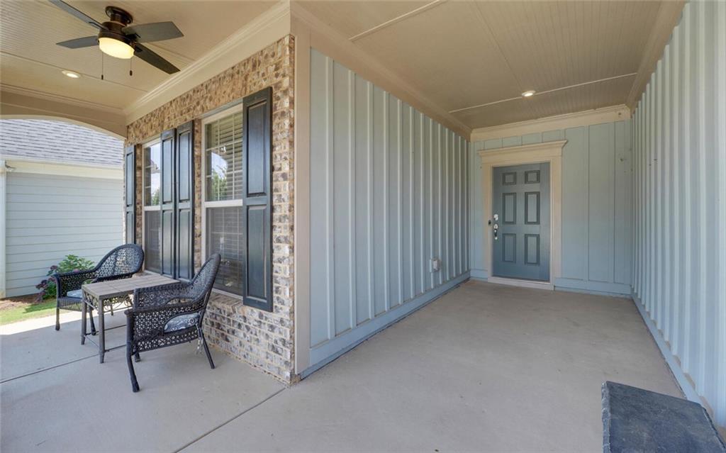 5825 Maple Bluff Way Hoschton, GA 30548 - Photo 5 of 67 a view of a hallway with seating area