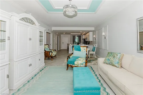 a living room with furniture and a table