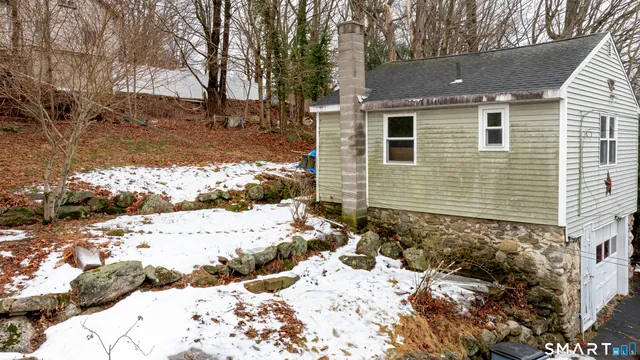 a view of a yard covered in snow