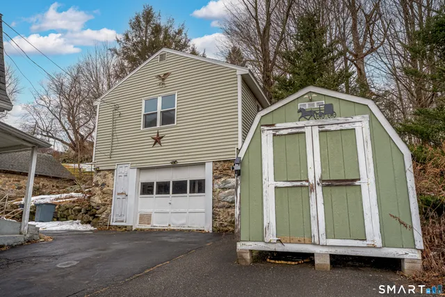 a front view of a house with a garage
