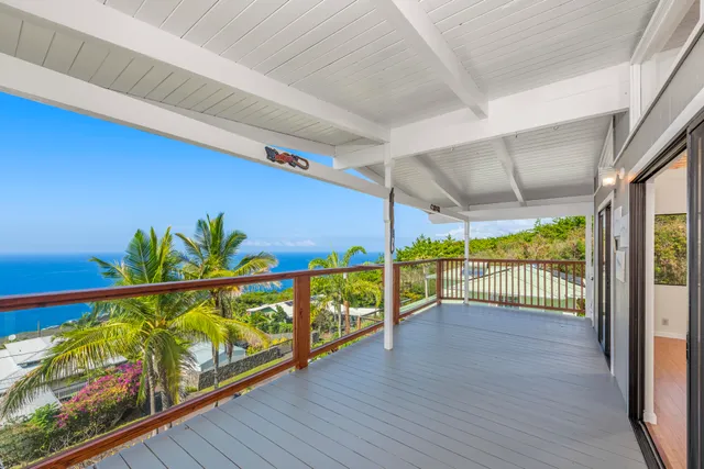 a view of a balcony with an outdoor space