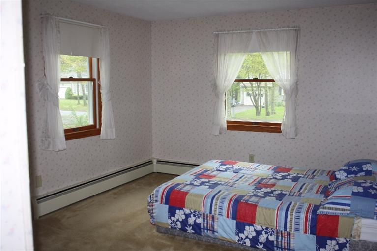 33 Goose Point Road Centerville, MA 02601 - Photo 16 of 29 a bedroom with a bed and a window
