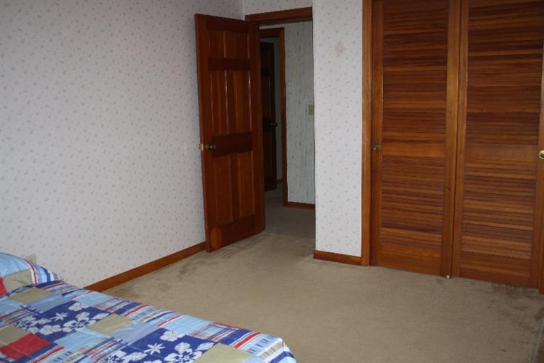 33 Goose Point Road Centerville, MA 02601 - Photo 17 of 29 a view of room with closet and wooden floor