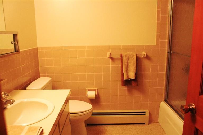 33 Goose Point Road Centerville, MA 02601 - Photo 18 of 29 a bathroom with a toilet and a sink