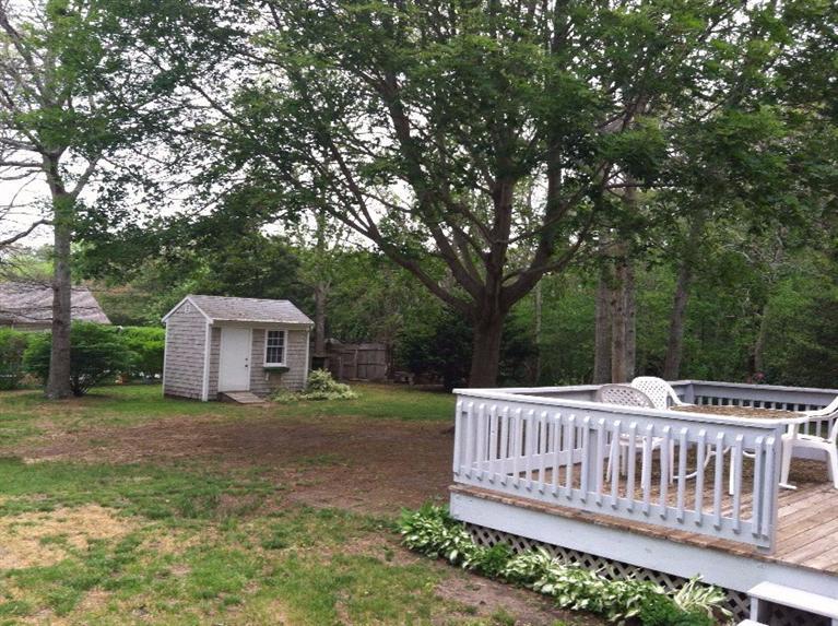 33 Goose Point Road Centerville, MA 02601 - Photo 27 of 29 a view of a house with a yard and deck