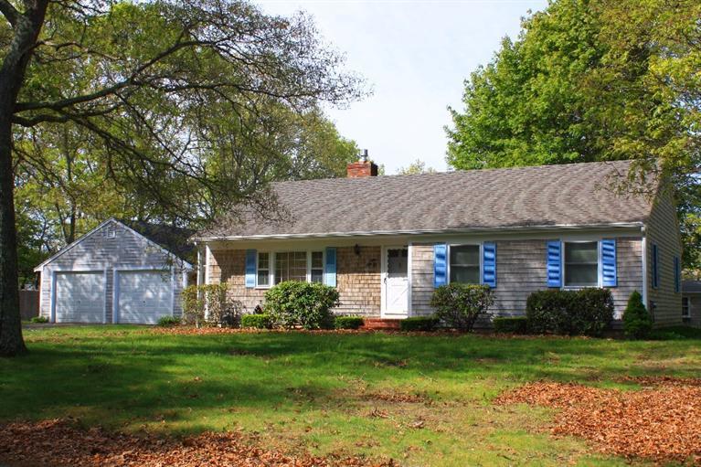 33 Goose Point Road Centerville, MA 02601 - Photo 4 of 29 a front view of house with yard and green space