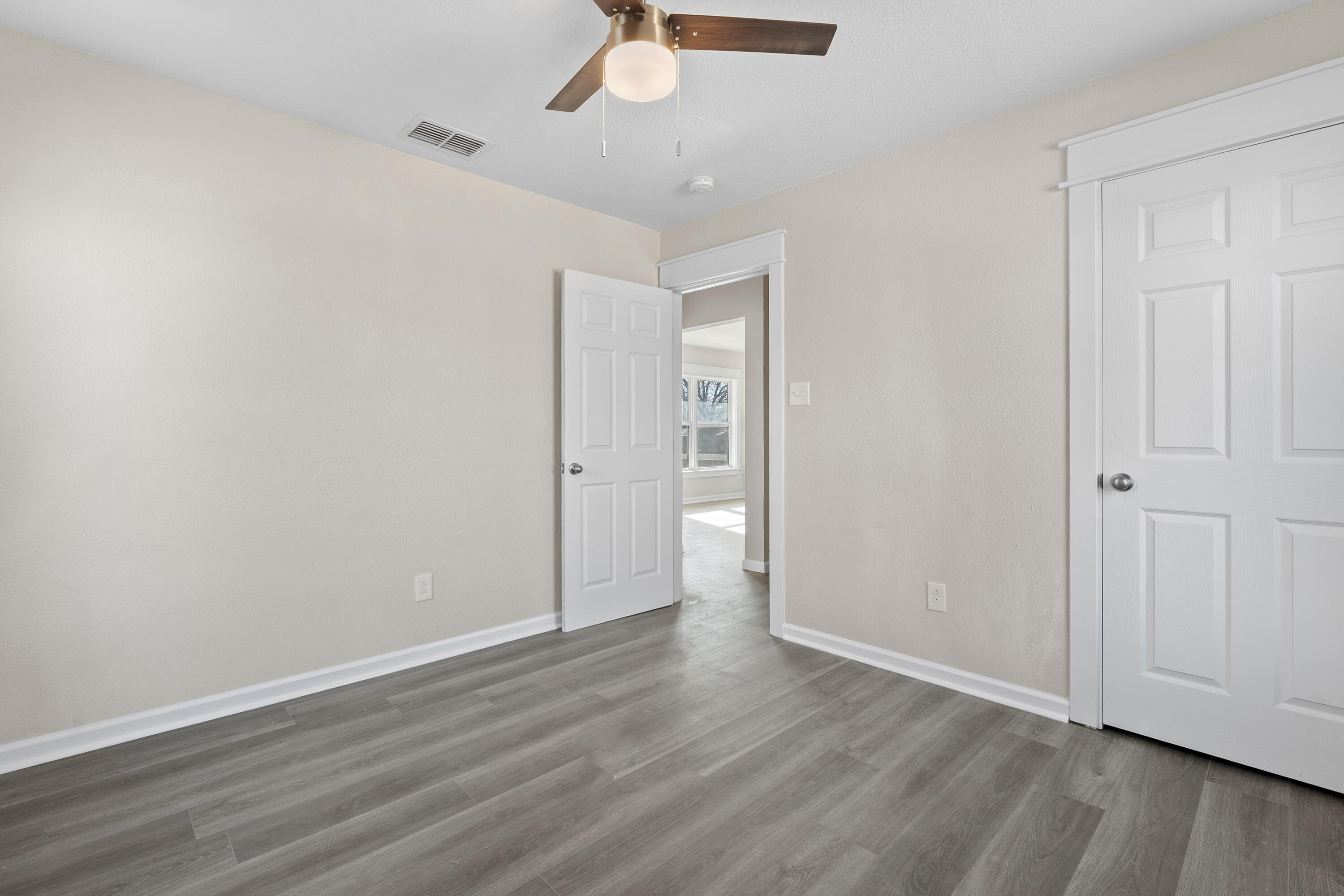 4820 39th Street Lubbock, TX 79414 - Photo 11 of 21 wooden floor in an empty room