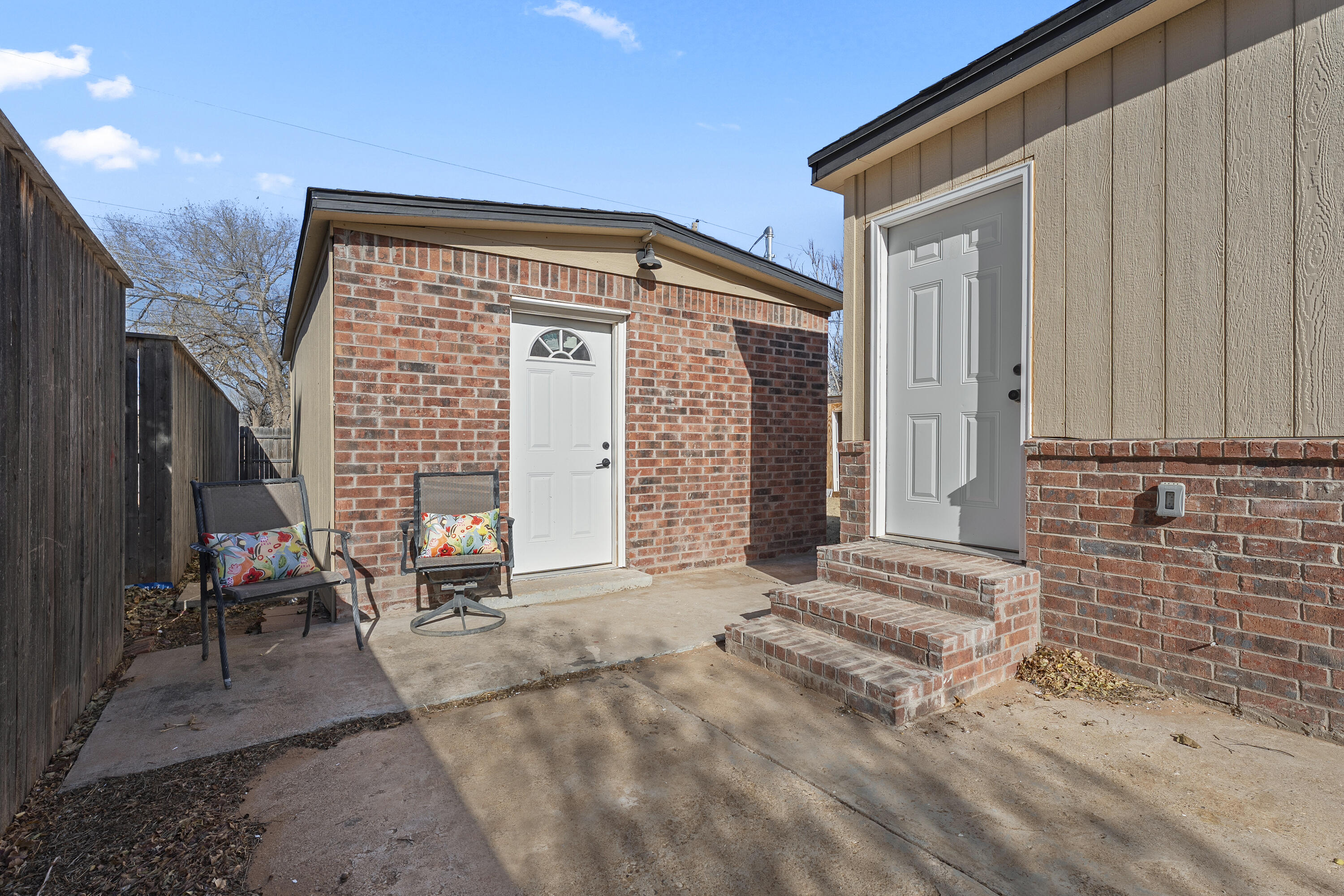 4820 39th Street Lubbock, TX 79414 - Photo 15 of 21 a backyard of a house with outdoor seating