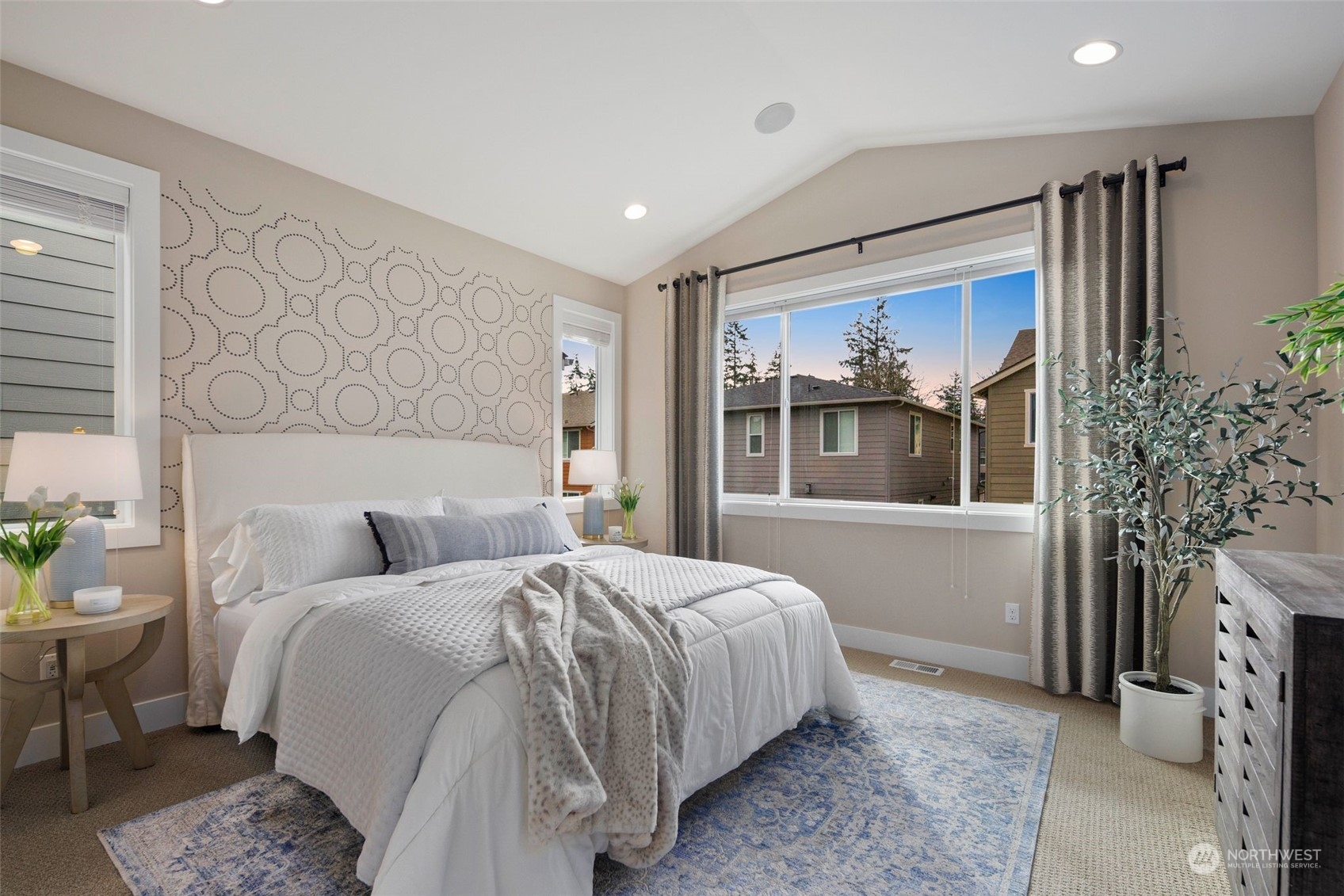 263 Graham Avenue Southeast Renton, WA 98059 - Photo 15 of 40 a bedroom with a large bed and a window