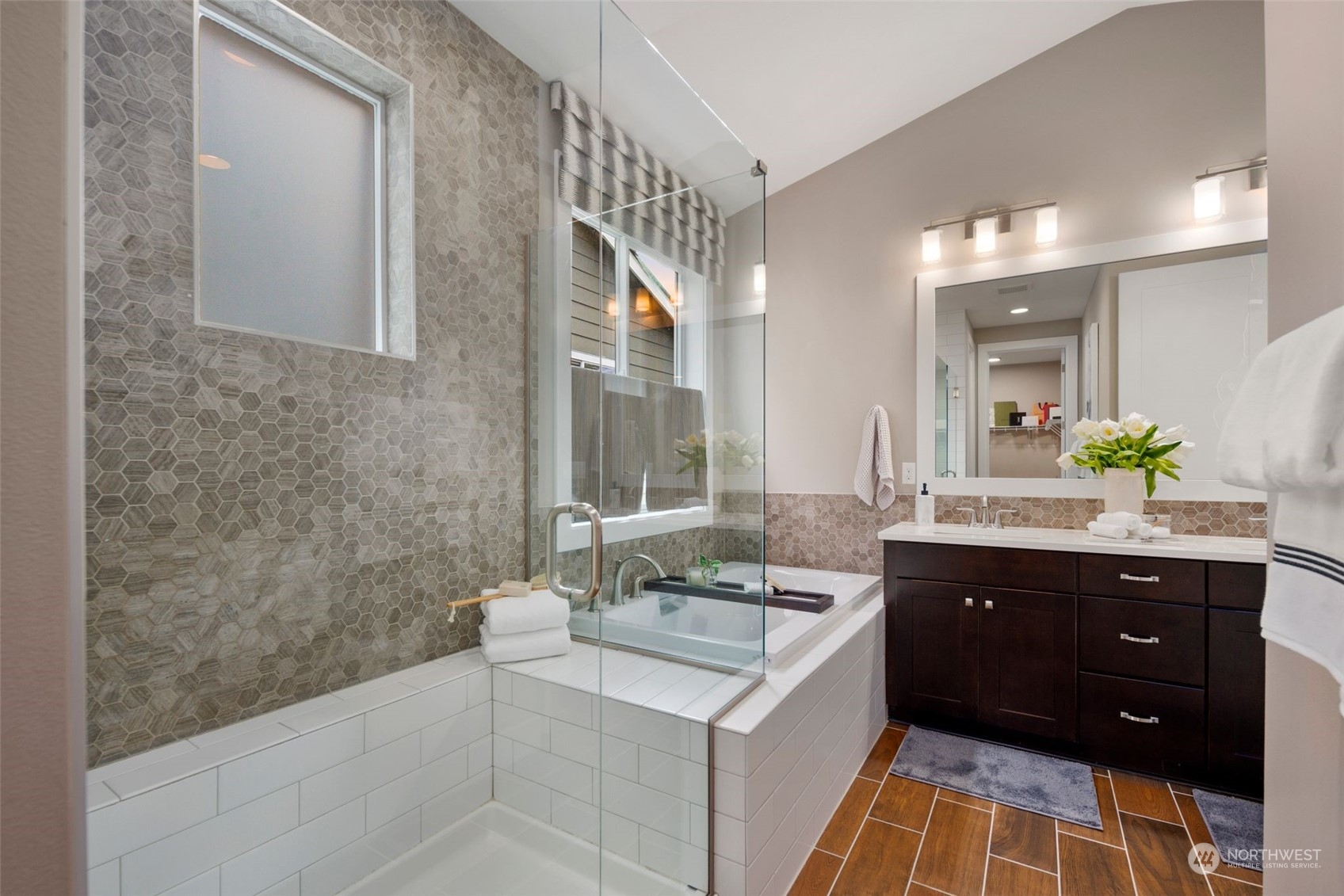 263 Graham Avenue Southeast Renton, WA 98059 - Photo 19 of 40 a spacious bathroom with a granite countertop sink and a bathtub