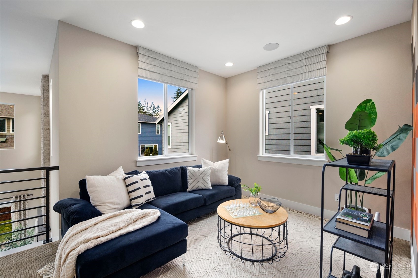 263 Graham Avenue Southeast Renton, WA 98059 - Photo 26 of 40 a living room with furniture and a potted plant