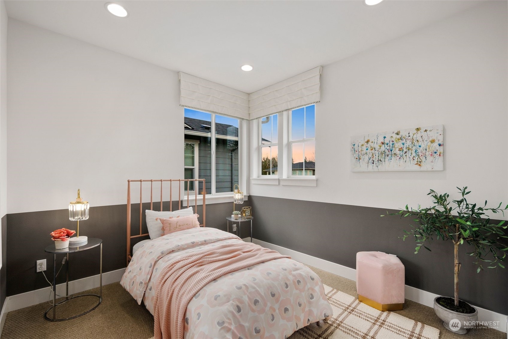 263 Graham Avenue Southeast Renton, WA 98059 - Photo 27 of 40 a bedroom with a bed and a potted plant