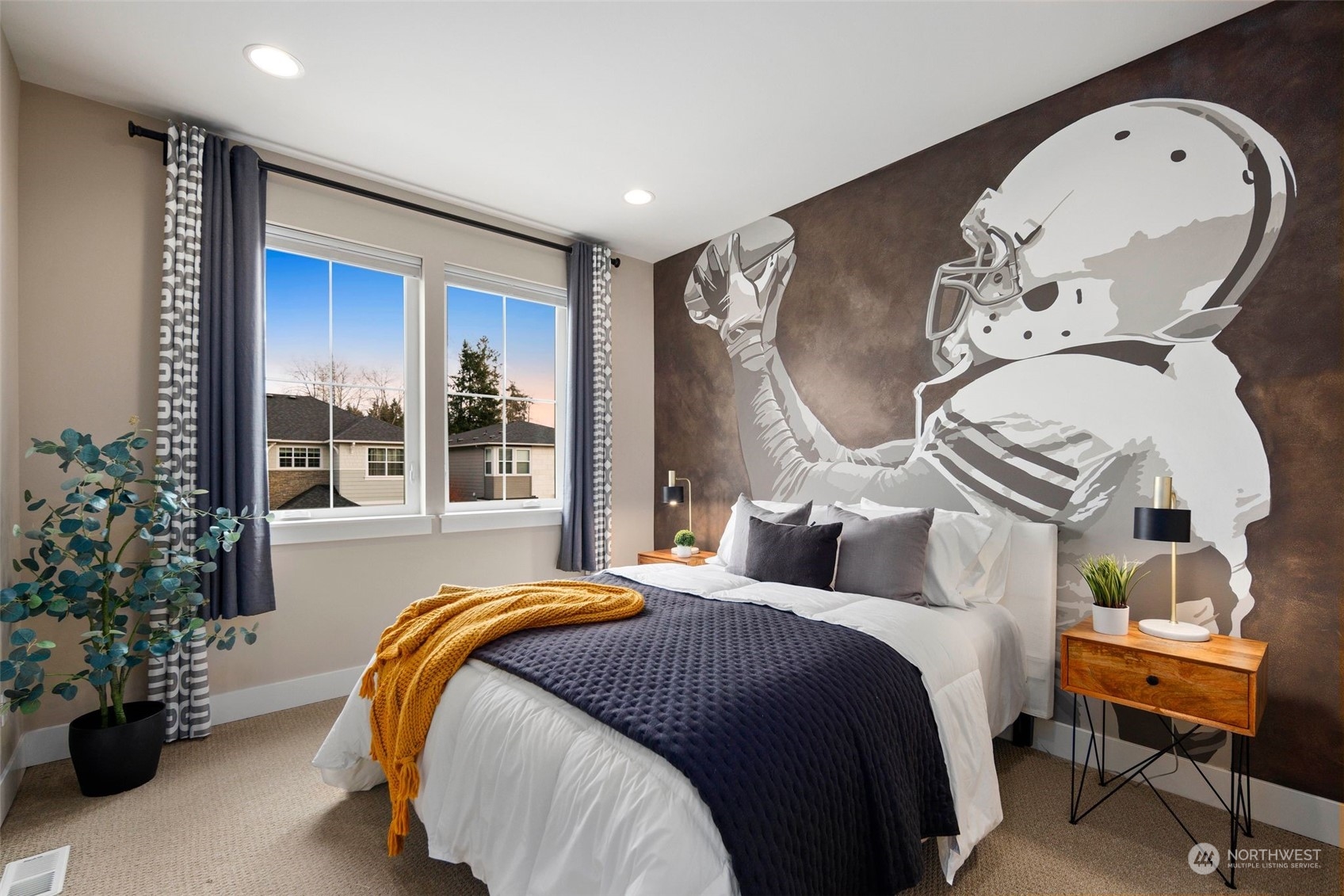 263 Graham Avenue Southeast Renton, WA 98059 - Photo 29 of 40 a bedroom with a bed and a chandelier