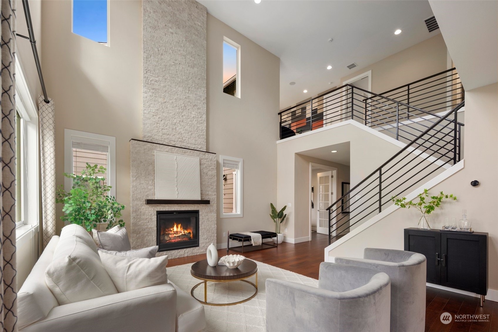263 Graham Avenue Southeast Renton, WA 98059 - Photo 3 of 40 a living room with furniture and a fireplace