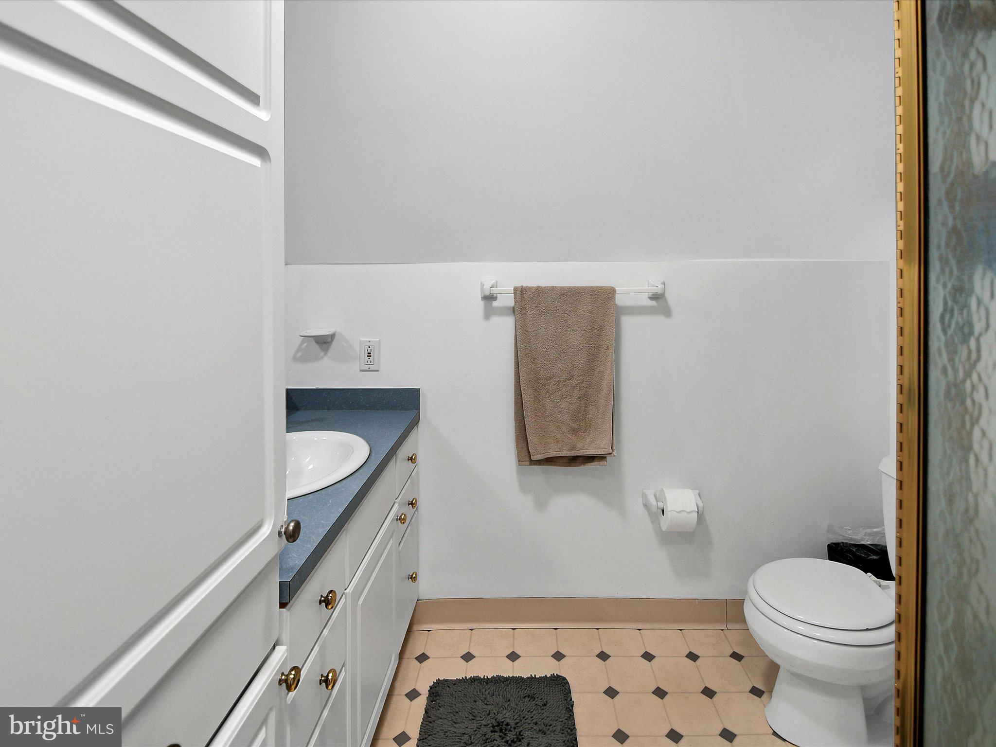 3 Bells Mill Road Glenside, PA 19038 - Photo 27 of 38 a bathroom with a toilet and a sink